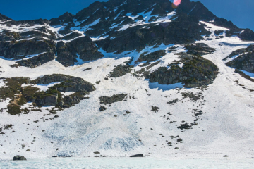 Blackcomb Lake was still frozen in early July